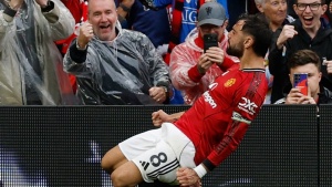 Headline:

Fernandes' Last-Minute Penalty Salvages 3-2 Win for Manchester United Against Burnley, Easing Pressure on Ten Hag
