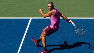 Carlos Alcaraz's Audacious Trick Shot Ignites US Open Crowd; Reveals Practice Secret
OR
US Open Roar: Alcaraz Wows Crowd with Unbelievable Behind-the-Back Shot, Admits to Practicing the Unconventional