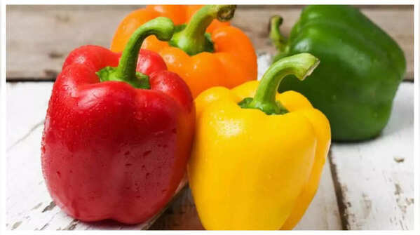 Fresh red bell peppers on a table