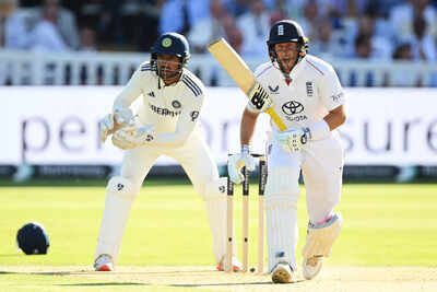 Joe Root celebrates a milestone at Lord's
