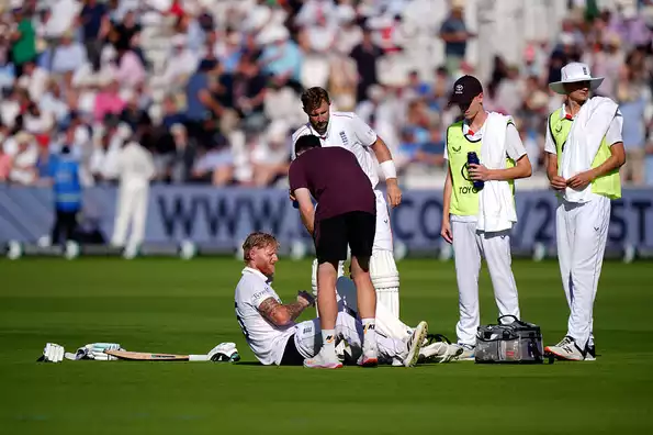 Stokes grimaces in pain during his innings.